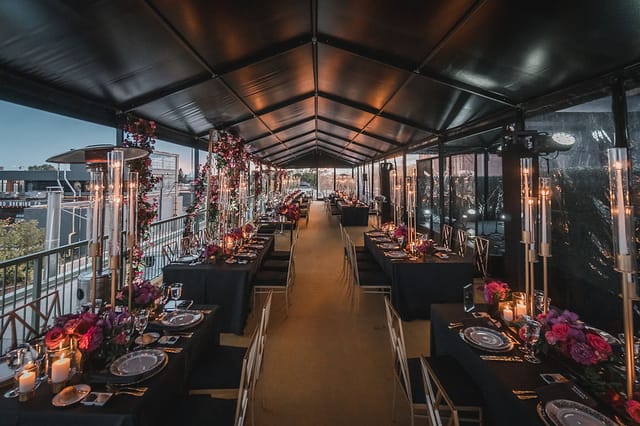 Luxury gala wedding at The Symes rooftop terrace with sophisticated marquee event decor.