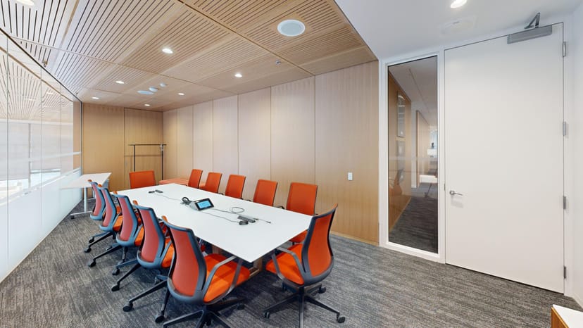 Modern boardroom at Schwartz Reisman Innovation Campus for hybrid meetings and strategy sessions.