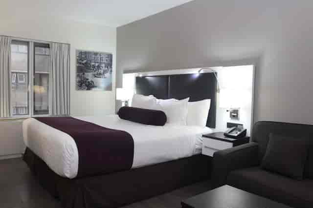 Hotel suite at The Saint James with integrated workspace, ideal for business travel and meetings.