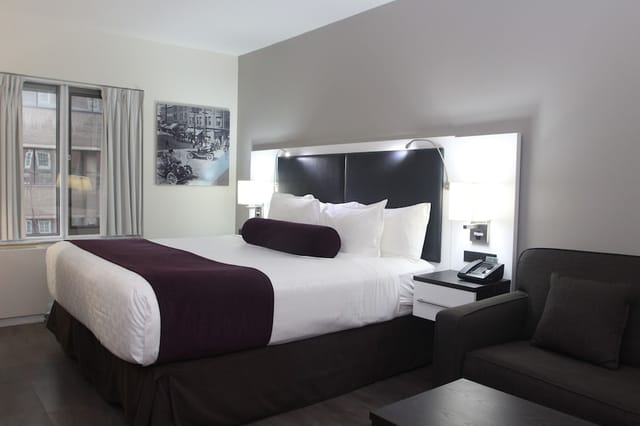 Hotel suite at The Saint James with integrated workspace, ideal for business travel and meetings.