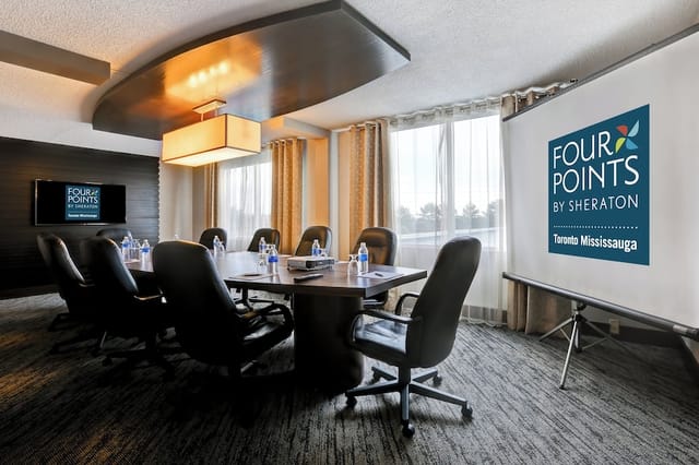 The Cambridge Club boardroom for professional strategy sessions and business meetings.