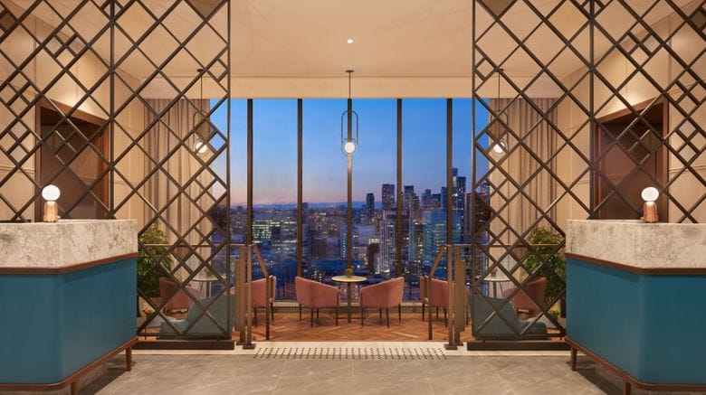 Luxury executive lounge with skyline view for corporate networking and VIP events.