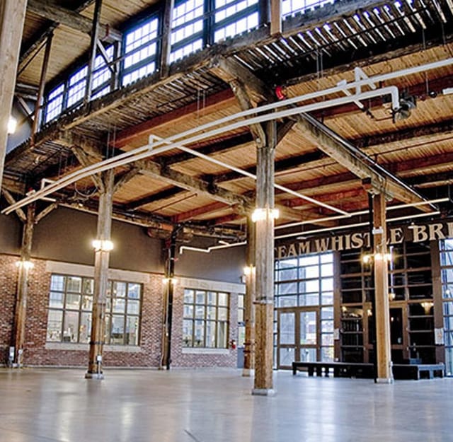 Locomotive Hall: Industrial-chic event venue with timber ceilings for weddings and corporate events.