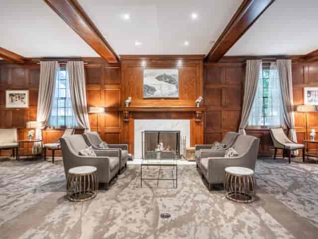 The Primrose Room boardroom with wood paneling for executive meetings and VIP events.
