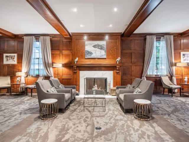 The Primrose Room boardroom with wood paneling for executive meetings and VIP events.