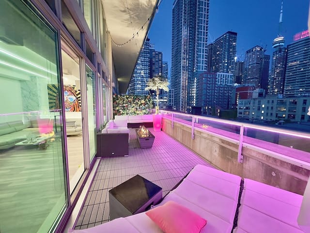 Rooftop patio at The Loft on King with purple mood lighting, ideal for VIP receptions and parties.