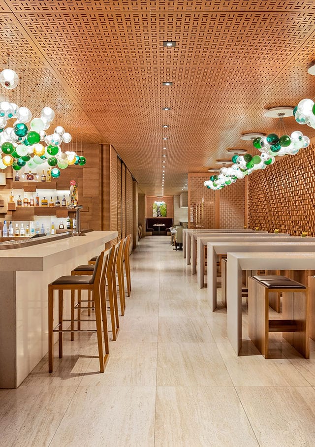 High-end Bosk restaurant venue with ambient lighting for corporate cocktail events and networking.