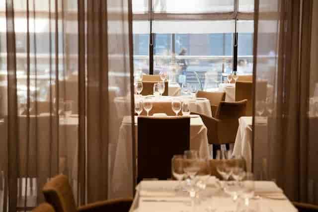 Modus Ristorante private dining room with sheer drapery for corporate events and client lunches.