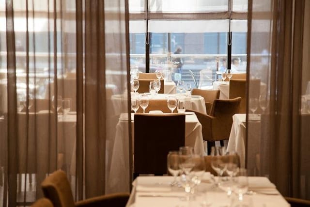 Modus Ristorante private dining room with sheer drapery for corporate events and client lunches.