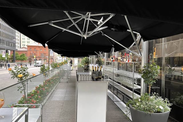 Modus Ristorante outdoor bar for high-end corporate networking and reception events.