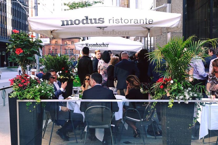 Modus Ristorante patio setup for corporate happy hour and networking event.
