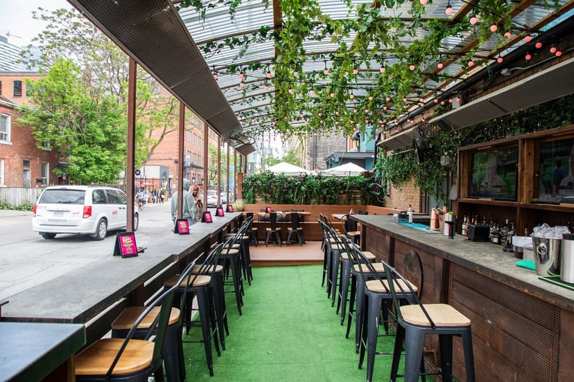 Patio at Petty Cash: Covered outdoor venue for networking mixers and cocktail receptions.
