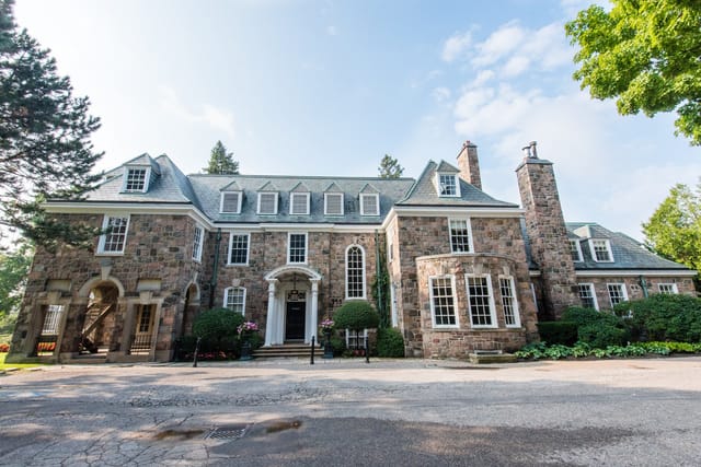 McLean House stone estate for upscale weddings and executive retreats.