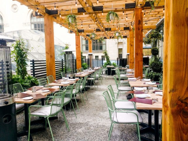 South Room outdoor event space with bistro seating for cocktail hours and intimate dinners.