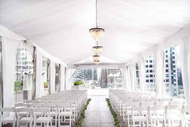 SixtyEight terrace wedding venue with ceiling draping for formal event presentations.