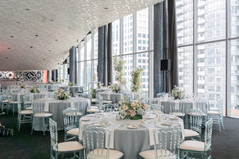 Modern SixtyEight terrace event space with ghost chairs for luxury weddings and corporate galas.