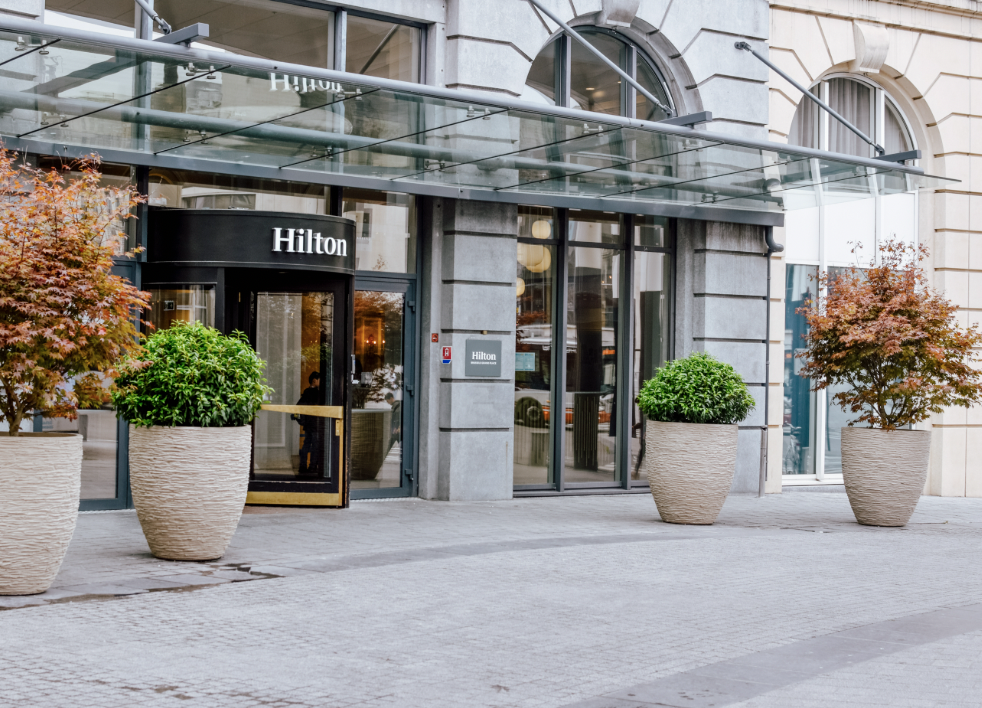 Maya at Hilton Brussels Grand Place, modern facade, ideal for corporate events.