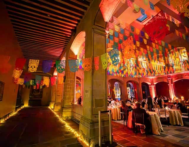 Papel picado decor at Club de Banqueros de México historic patio for corporate events and galas.