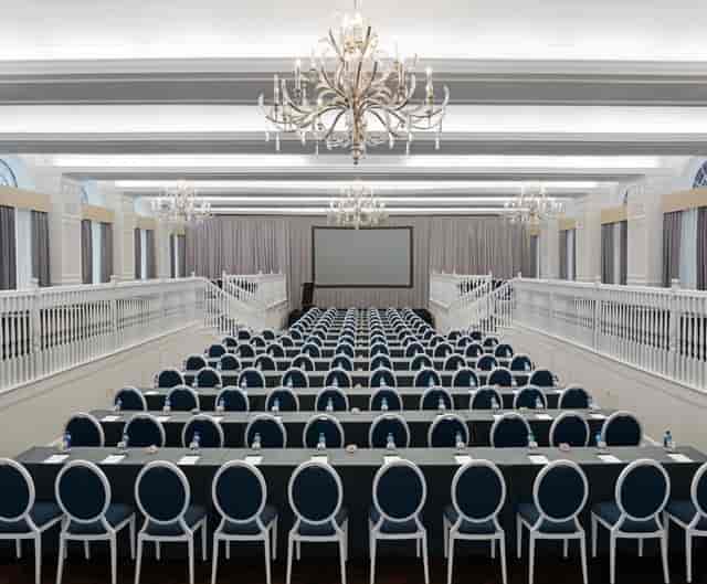 Del Prado Hall at The Don CeSar: Ballroom with chandelier lighting for corporate conference events.