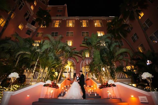 The Don CeSar courtyard with candlelit steps for luxury wedding and experiential events.