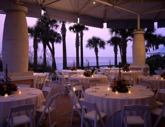Upscale outdoor reception at The Don CeSar North/South Terrace with elegant sunset table settings.