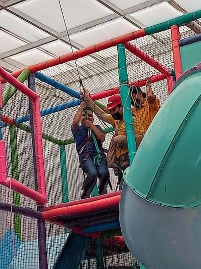 Playground team building event with safety staff in Lindavista - kids party risk management.