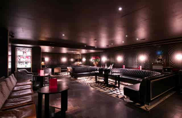 Stylish Mezzanine Bar at Quaglino's, ideal for upscale meetings and networking events.