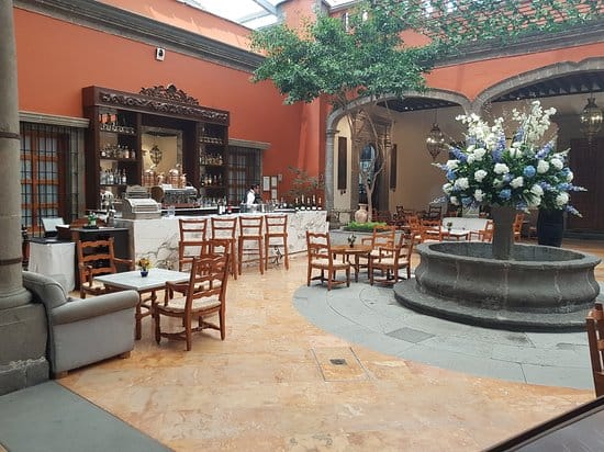 Hacienda de los Morales garden venue with centerpiece fountain for cocktail networking events.