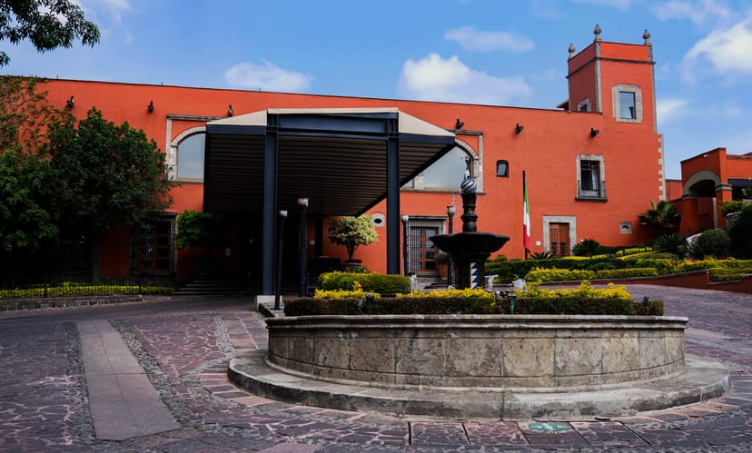 Luxury corporate retreat arrival at Hacienda de los Morales, bold event venue entrance.