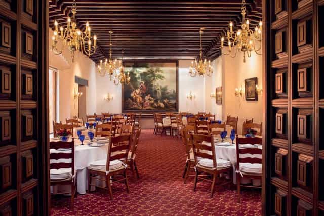 Hacienda de los Morales banquet hall with timber ceilings for corporate events and formal dinners.
