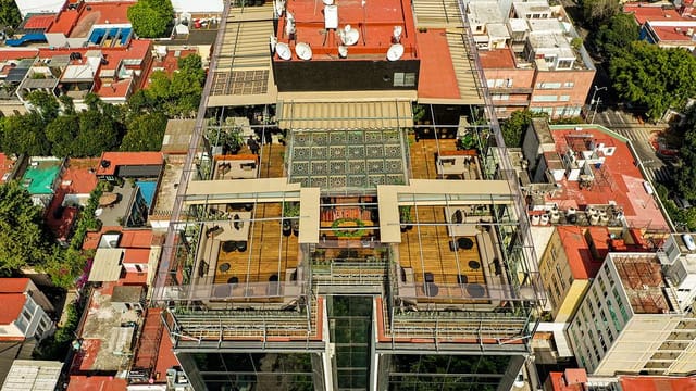 Rooftop venue at Hotel Roma Conesa with modular seating for corporate receptions and events.