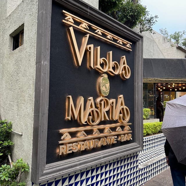 Villa Maria restaurant exterior with thematic branding for upscale corporate networking events.