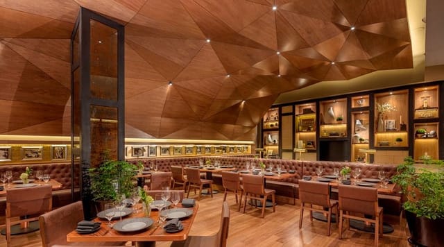Upscale Alfredo Di Roma dining room with wood decor for executive dinners and networking events.