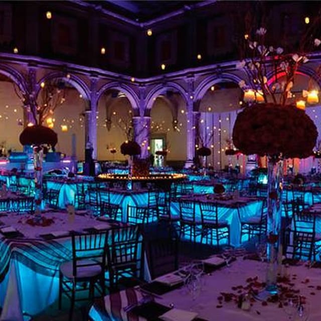 BENIU function room with dramatic uplighting and vaulted architecture for gala or corporate events.