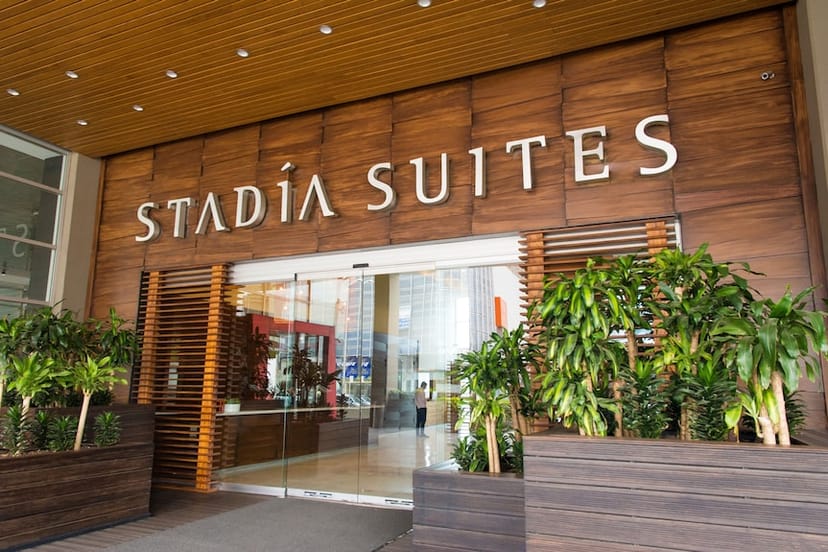 Stadia Suites Mexico City entrance, modern corporate meeting venue for business travel.