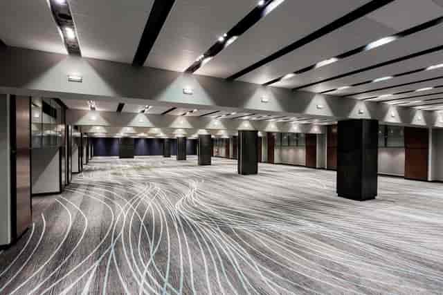 Modern ballroom at Hilton Mexico City Reforma with structural pillars for flexible event planning.