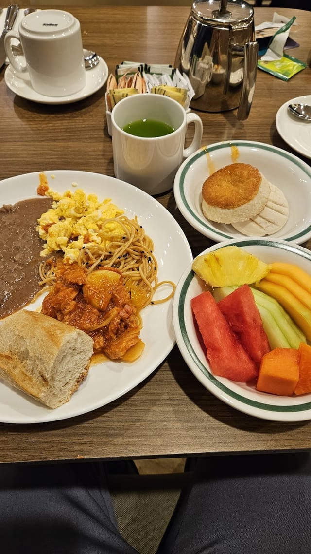 Accor Hotels training room buffet featuring diverse breakfast entrees for corporate event catering.