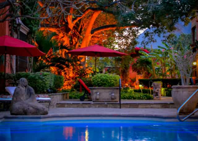 Hacienda de los Santos poolside villa venue for evening welcome reception and VIP networking.