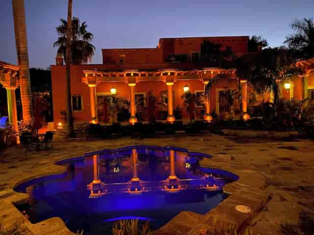 Luxury suite courtyard with reflective pool for intimate corporate cocktail hour and gala dinners.