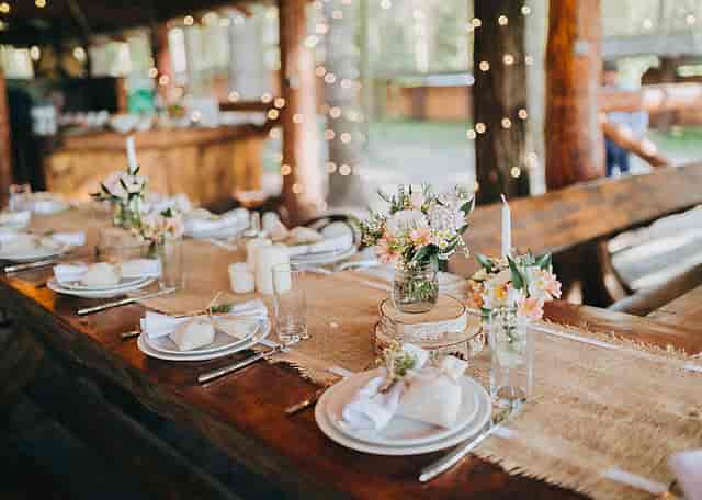 Rustic-chic coffee break tablescape with wood accents for outdoor weddings and corporate events.