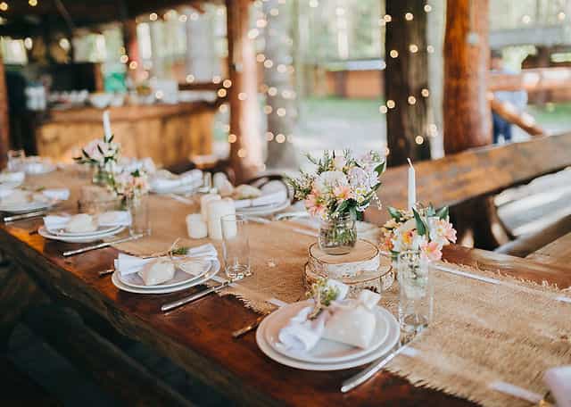 Rustic-chic coffee break tablescape with wood accents for outdoor weddings and corporate events.