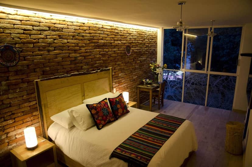 Boutique executive retreat room with rustic workstation for corporate events and business travel.