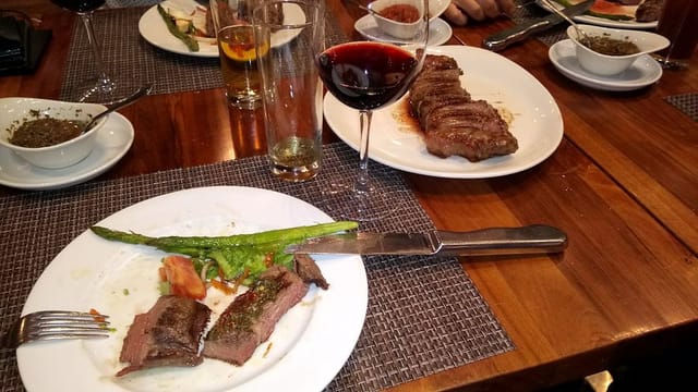 Corporate business dinner at Rincon Argentino featuring high-protein menu, ideal for networking.