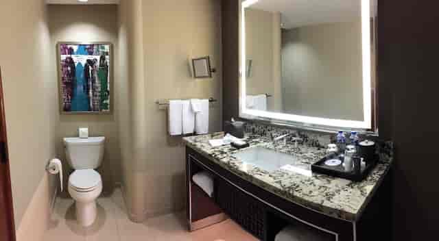 Luxury hotel guest bathroom, stone counters, JW Marriott Chapultepec event venue accommodation.