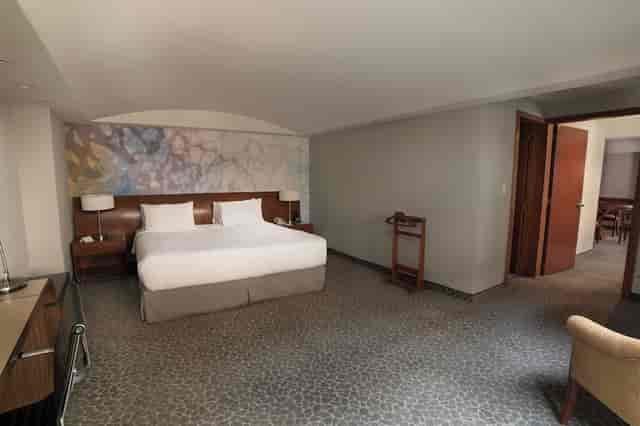 Modern hotel guest room at Courtyard Mexico City Revolucion for business travel and events.