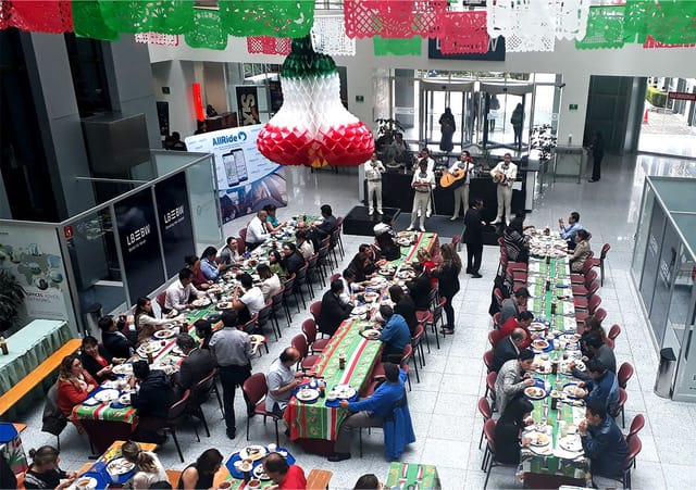 Corporate luncheon at German Centre Mexico with banquet seating and festive Mexican decor.
