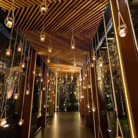 Tiered hanging lantern entryway for luxury gala or brand activation at Bodas in Altto San Ángel.