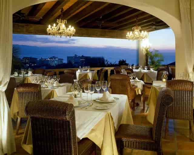 Rooftop restaurant at Hacienda San Angel with elegant chandeliers for corporate dinner or events.