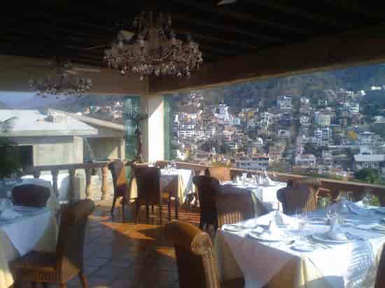 Hacienda San Angel rooftop terrace with chandeliers for upscale banquets and networking events.