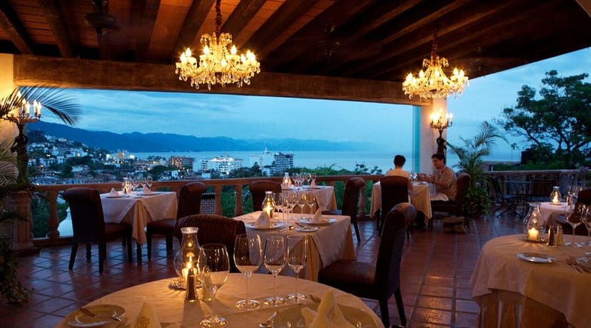 Anniversary dinner at Hacienda San Angel terrace with elegant table settings for luxury events.